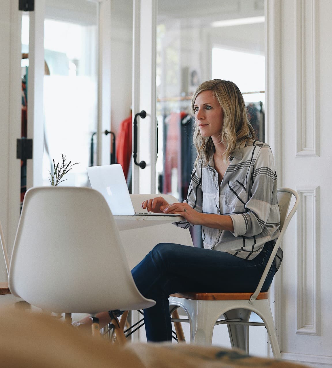 Professional woman working on laptop - EU AI Act Compliance Training